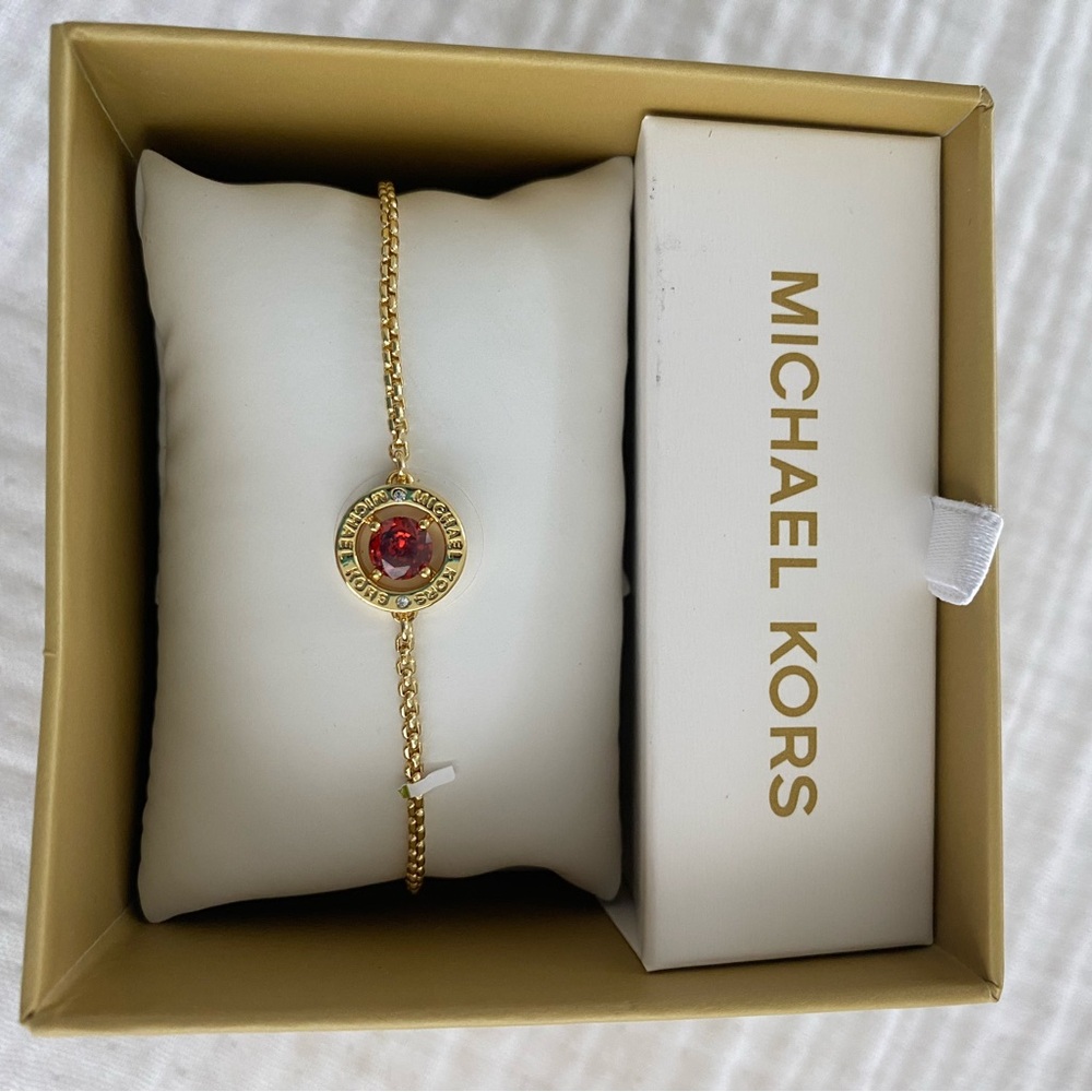 Michael Kors Gold Bracelet with Red Accent